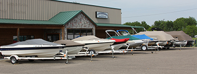line of boats with custom canvas covers